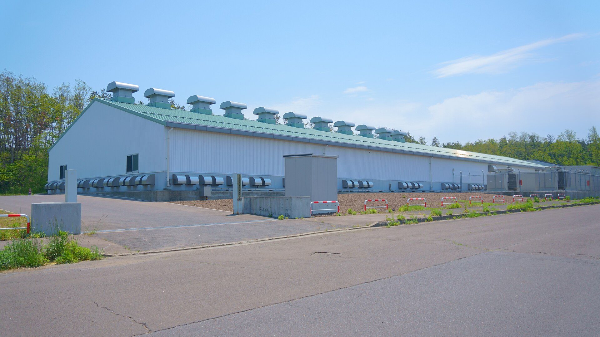 Containerized battery energy storage system installed at an industrial site